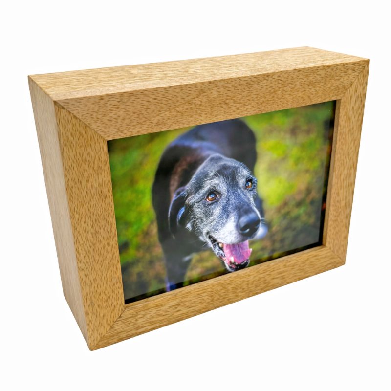 Mango wood photo frame urn displaying a sample pet photo
