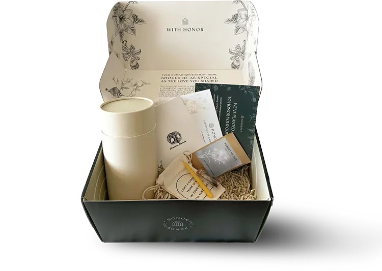 The Honor Box with an urn, certificate, seed packet, and memorial keepsakes